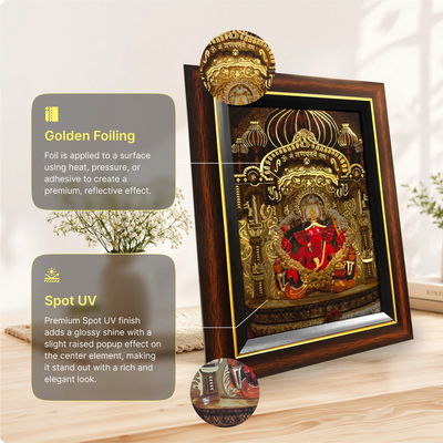 Close-up of golden foil detailing on the Siddhi Vinayak table frame