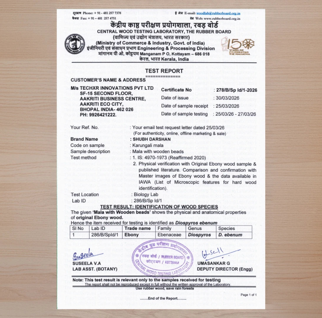 Central Wood Testing Laboratory certificate from Rubber Board, Ministry of Commerce and Industry, Government of India, confirming the Karungali Mala wood species as authentic Ebony Diospyros ebenum — issued to brand Shubh Darshan, manufactured by TechXR Innovations Pvt Ltd