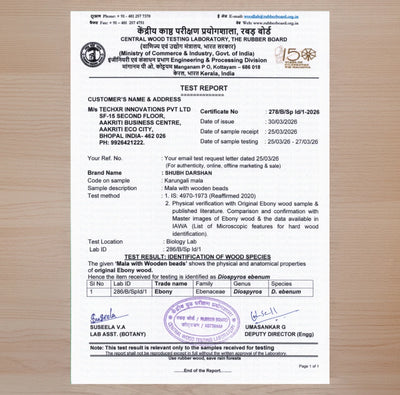 Central Wood Testing Laboratory certificate from Rubber Board, Ministry of Commerce and Industry, Government of India, confirming the Karungali Mala wood species as authentic Ebony Diospyros ebenum — issued to brand Shubh Darshan, manufactured by TechXR Innovations Pvt Ltd